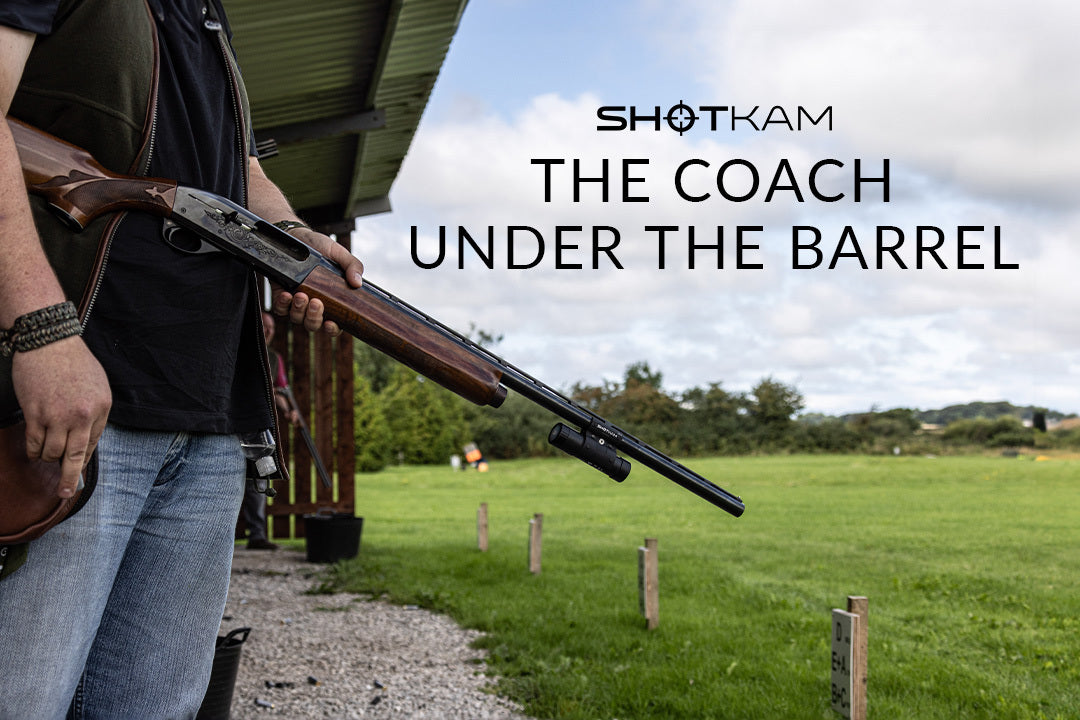 Enhancing trapshooting in Europe: Hunter with a ShotKam-mounted shotgun, showcasing the value of barrel coaching on the range.
