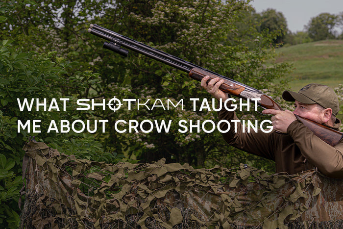 Crow shooting setup featuring a shotgun with ShotKam attached as Rob Speed tracks birds overhead
