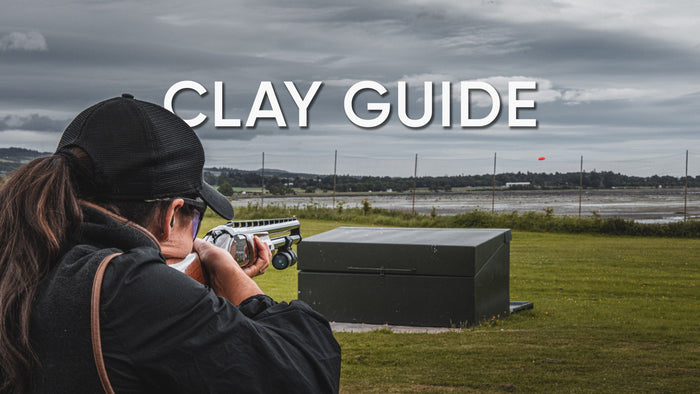 Clay shooter tracking a flying target with a ShotKam-equipped shotgun