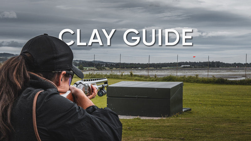 Clay shooter tracking a flying target with a ShotKam-equipped shotgun