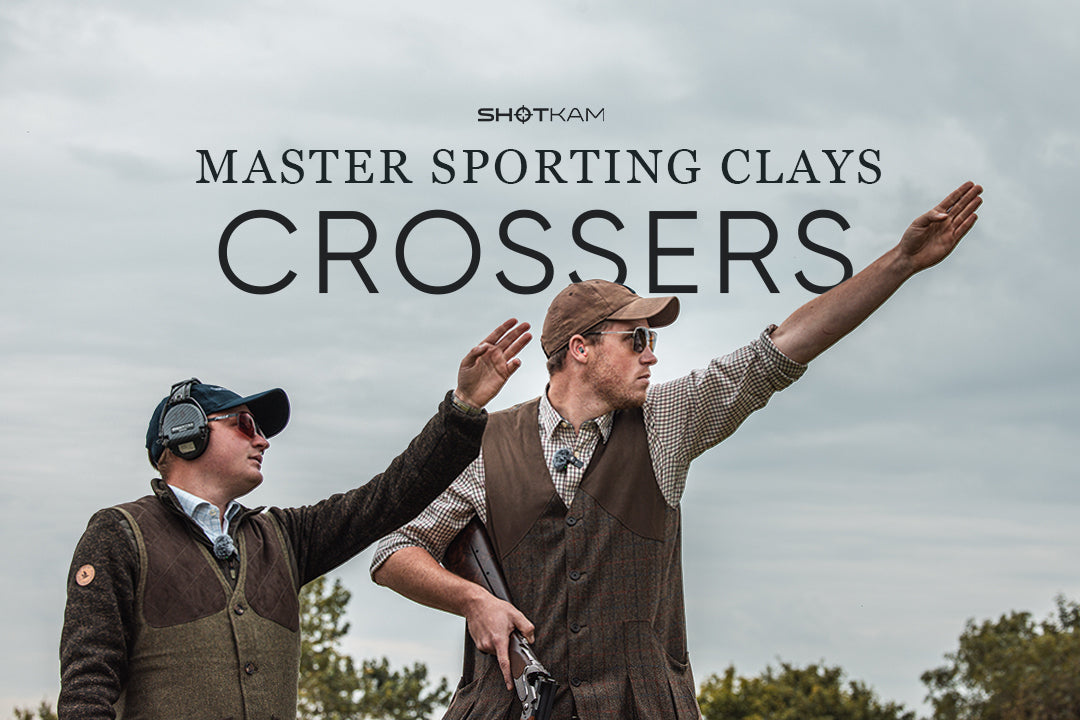 Clay shooting instructors practicing crossers with ShotKam for the Master Sporting Clays series, set against a European countryside.